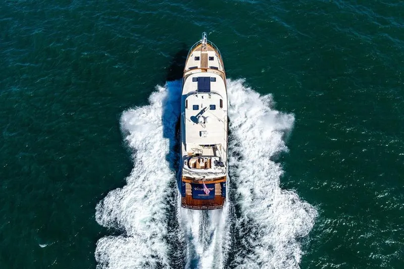 Slide: The Image of Aerial view of 2015 Marlow 66E-CB yacht cruising through blue ocean waters. - 8