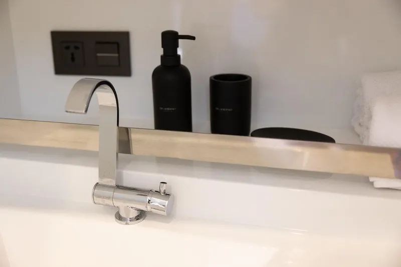 Slide: The Image of 2026 De Antonio Yachts D36 logo on sleek white surface. - 26