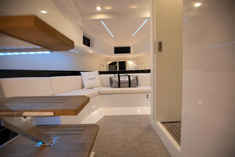 Slide: The Image of Luxurious interior of 2026 De Antonio Yachts D36, featuring modern seating and ambient lighting. - 15