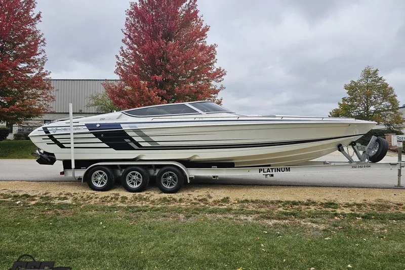 Slide: The Image of 2019 Formula 292 FASTech boat on trailer, sleek design, parked outdoors. - 10