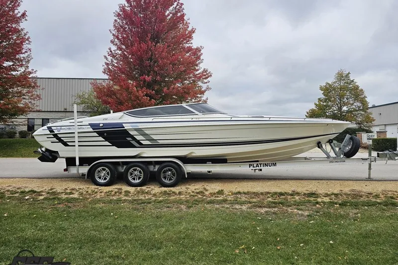 Slide: The Image of 2019 Formula 292 FASTech boat on trailer outside a building. - 11