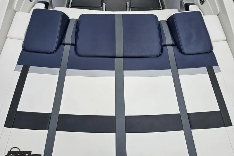 Slide: The Image of 2019 Formula 292 FASTech boat rear view with dual propellers in a sunny outdoor setting. - 30