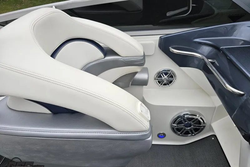 Slide: The Image of Overhead view of 2019 Formula 292 FASTech boat interior with white seating and steering wheel. - 40