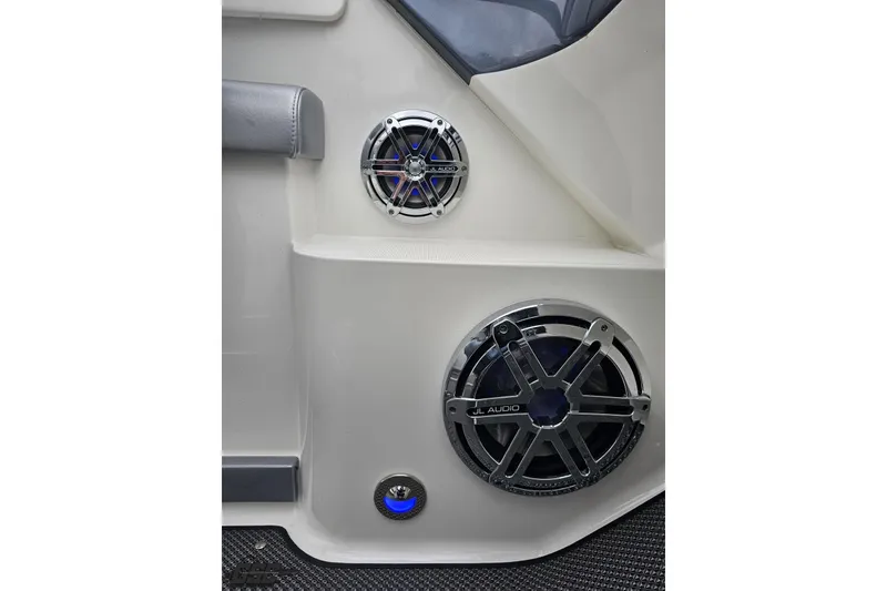 Slide: The Image of 2019 Formula 292 FASTech boat dashboard with control panel and warning label. - 42