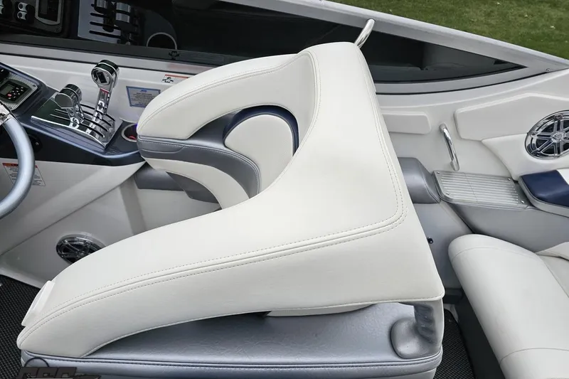 Slide: The Image of 2019 Formula 292 FASTech boat interior with sleek black and white seating design. - 44