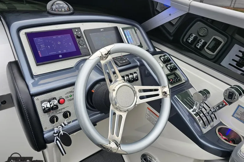 Slide: The Image of 2019 Formula 292 FASTech boat interior with seating and dashboard view. - 45