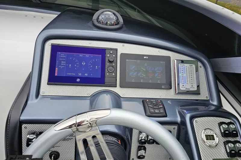 Slide: The Image of 2019 Formula 292 FASTech boat interior with dual seats and steering wheel. - 47