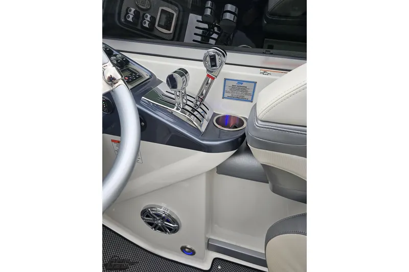 Slide: The Image of 2019 Formula 292 FASTech boat cockpit with steering wheel and controls. - 50