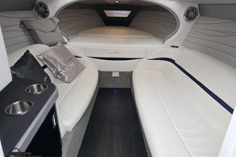 Slide: The Image of 2019 Formula 292 FASTech boat interior with sleek seating and modern dashboard design. - 54