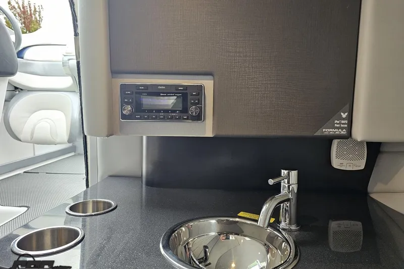 Slide: The Image of 2019 Formula 292 FASTech boat detail with speakers and cup holder. - 55