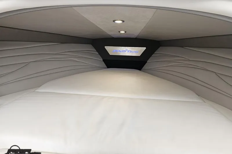 Slide: The Image of 2019 Formula 292 FASTech boat interior with sleek, modern seating and speaker system. - 57