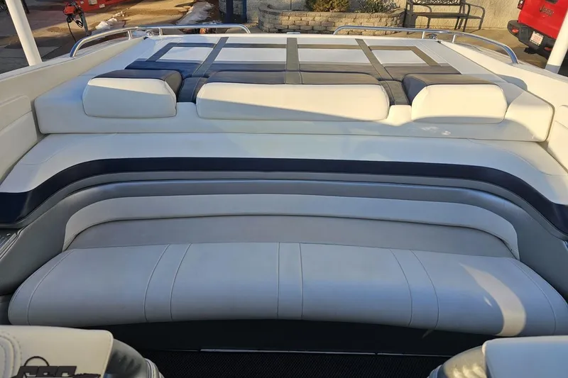 Slide: The Image of 2019 Formula 292 FASTech boat interior with white and navy seating. - 80