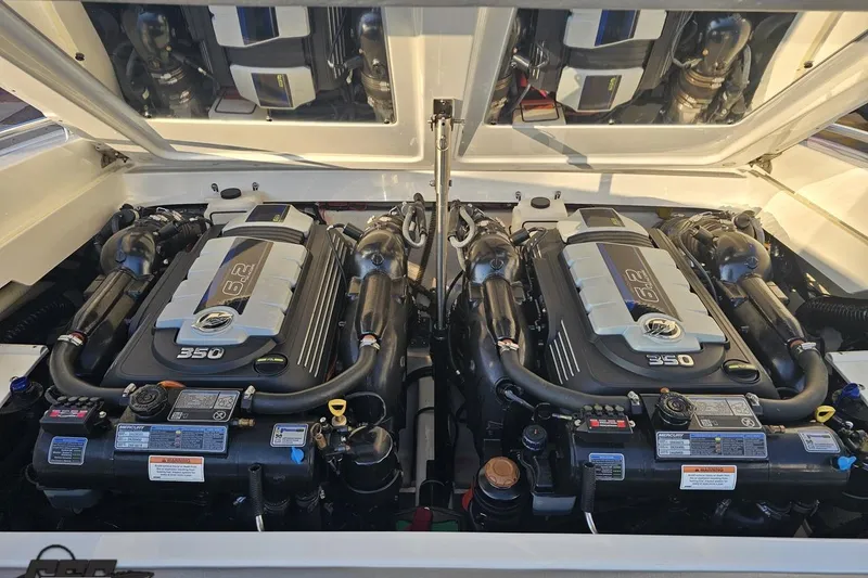 Slide: The Image of Twin 6.2L engines in a 2019 Formula 292 FASTech boat engine compartment. - 87