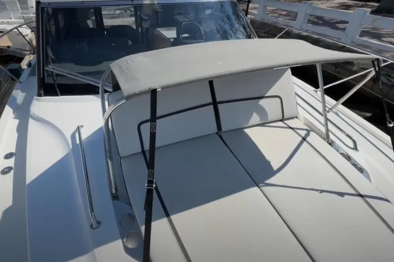 Slide: The Image of 2023 Bavaria R40 Coupe boat with sunshade and sleek deck design. - 17