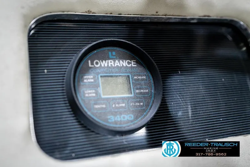 Slide: The Image of Lowrance depth finder on 1987 Sea Ray Sorrento 21 boat dashboard. - 32