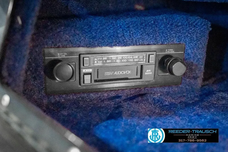 Slide: The Image of 1987 Sea Ray Sorrento 21 featuring an Audiovox AM/FM stereo cassette player. - 39