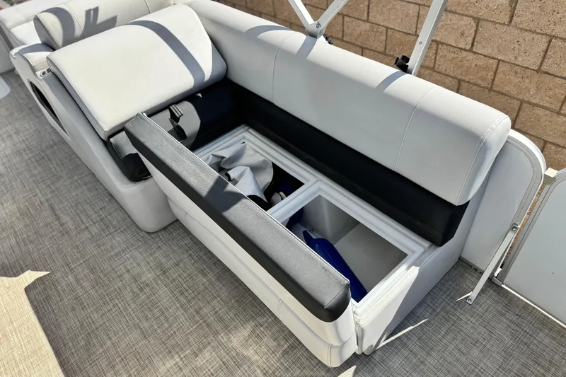 Slide: The Image of 2020 SunCatcher V24 SS boat seat with open storage compartment. - 15