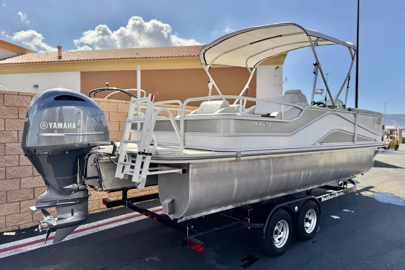 Slide: The Image of 2020 SunCatcher V24 SS pontoon boat with Yamaha motor on trailer. - 6