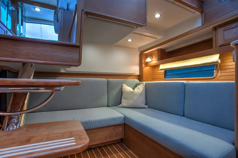 Slide: The Image of Manufacturer Provided Image: Luxurious interior of 2026 Sabre 38 Salon Express yacht with modern kitchen and cozy bedroom. - 8