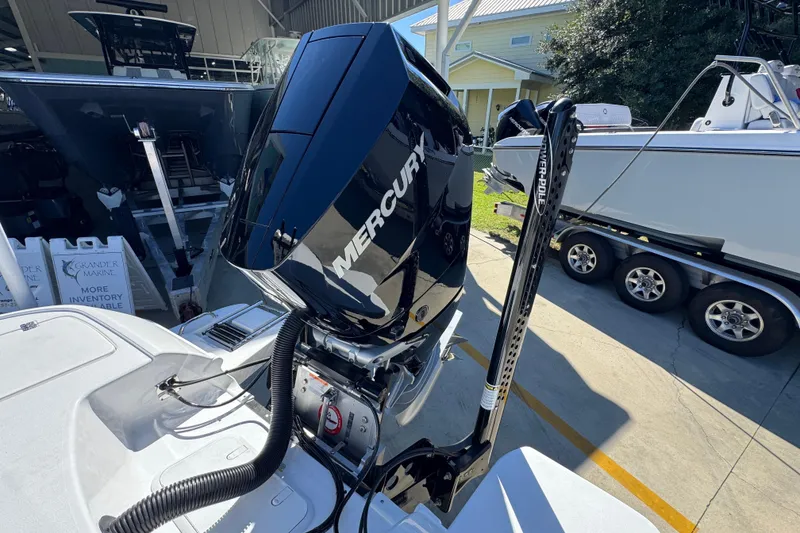 Slide: The Image of 2026 Caymas 26 HB boat with Mercury outboard engine and Power-Pole anchor system. - 34