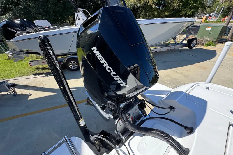 Slide: The Image of 2026 Caymas 26 HB boat with Mercury outboard engine and Power-Pole anchor system. - 35