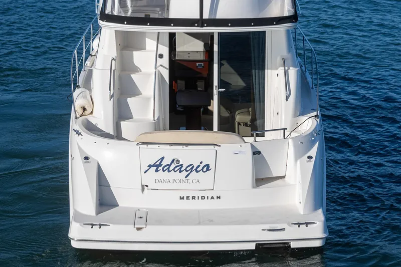 Slide: The Image of 2011 Meridian 341 Sedan boat named "Adagio" at Dana Point, CA, on water. - 17