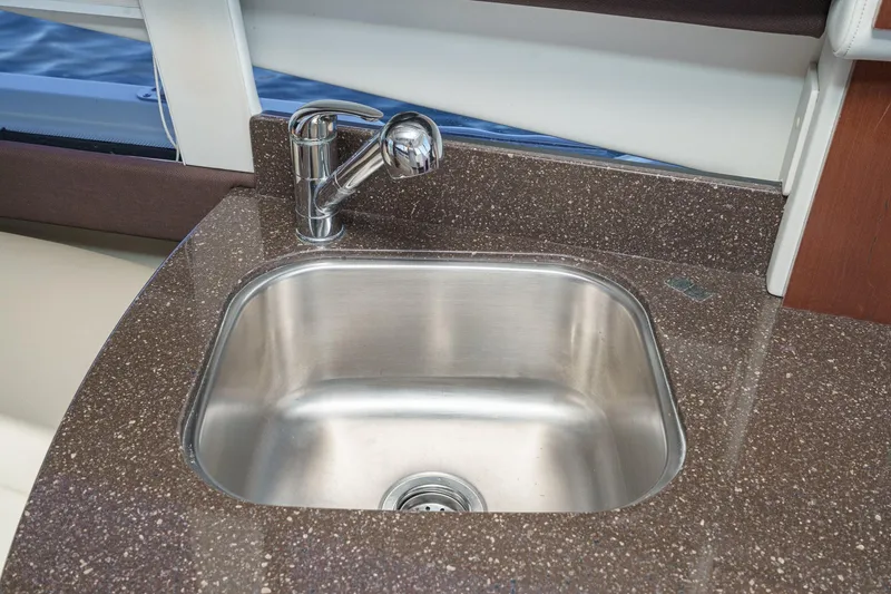 Slide: The Image of Stainless steel sink in 2011 Meridian 341 Sedan yacht kitchen area. - 29