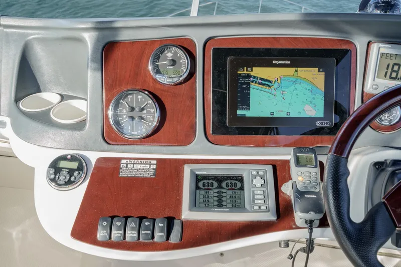 Slide: The Image of Dashboard of a 2011 Meridian 341 Sedan with navigation and control instruments. - 7