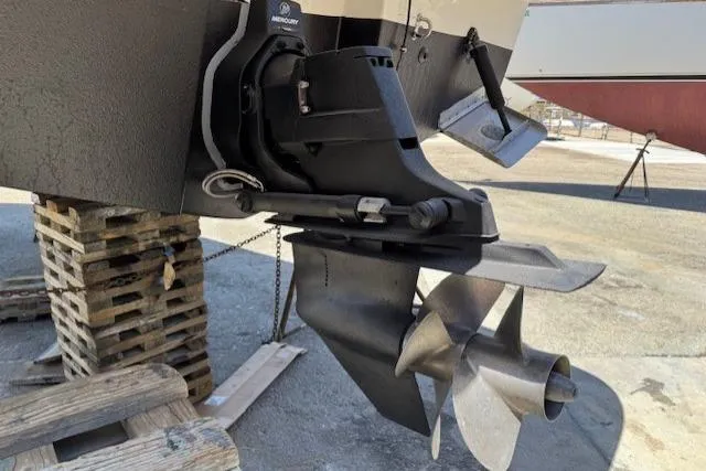 Slide: The Image of 2010 Bayliner 255 Cruiser boat propeller and stern drive on dry dock. - 6