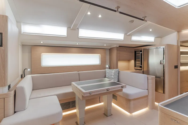 Slide: The Image of Luxurious interior of 2023 Beneteau Oceanis Yacht 60 with modern seating and dining area. - 27