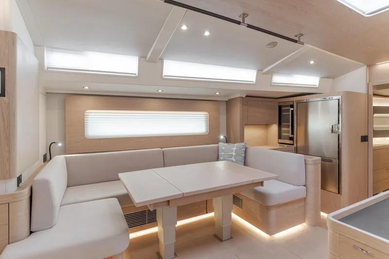 Slide: The Image of Luxurious interior of 2023 Beneteau Oceanis Yacht 60 with modern dining area. - 28