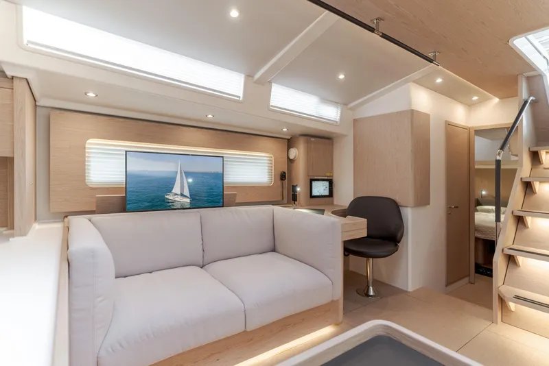 Slide: The Image of Luxurious interior of 2023 Beneteau Oceanis Yacht 60 with modern furnishings and elegant design. - 31