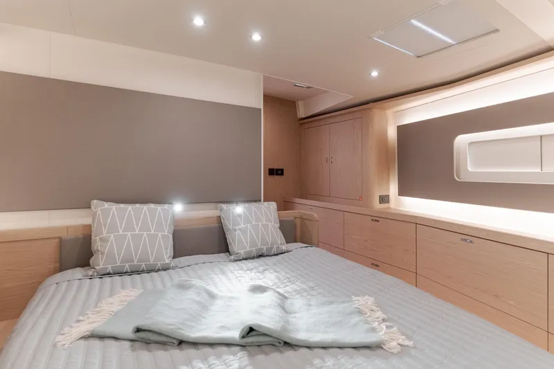 Slide: The Image of Luxurious bedroom interior of 2023 Beneteau Oceanis Yacht 60 with modern design. - 38
