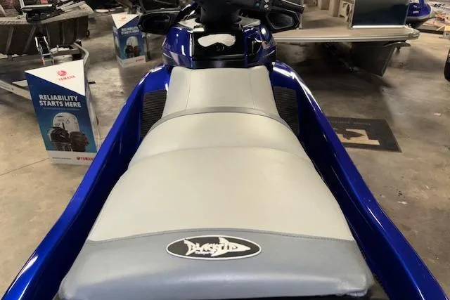 Slide: The Image of 2014 Yamaha WaveRunner FX Cruiser HO, blue and gray seat, displayed indoors. - 13