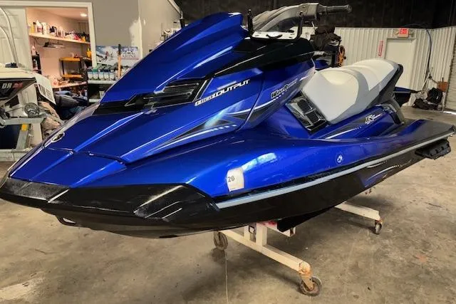 Slide: The Image of 2014 Yamaha WaveRunner FX Cruiser HO in a garage setting. - 3
