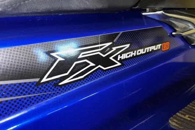 Slide: The Image of 2014 Yamaha WaveRunner FX Cruiser HO, blue with "High Output" decal. - 4