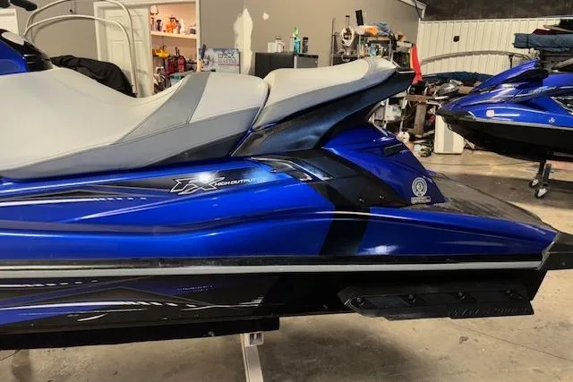 Slide: The Image of 2014 Yamaha WaveRunner FX Cruiser HO in a garage setting. - 6