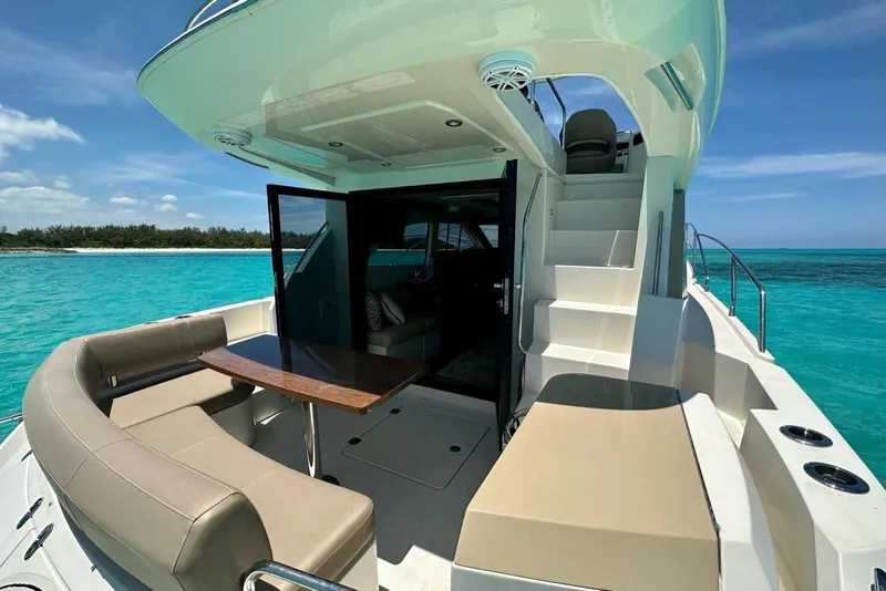 Slide: The Image of Luxurious 2017 Carver C40 yacht with spacious deck, cruising on turquoise waters. - 10