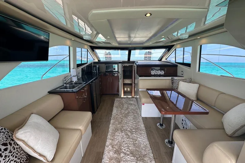 Slide: The Image of Luxurious interior of 2017 Carver C40 yacht with elegant seating and ocean view. - 6