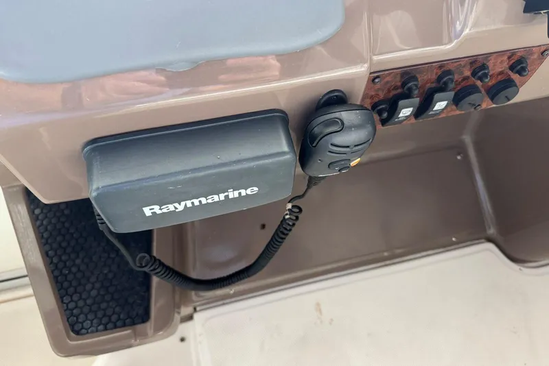 Slide: The Image of Control panel of 2005 Regal 3360 Window Express with Raymarine equipment. - 20