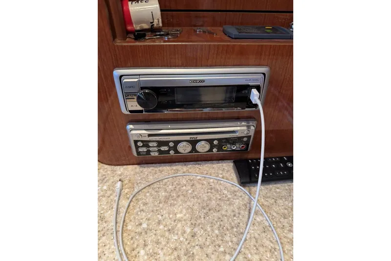 Slide: The Image of 2005 Regal 3360 Window Express audio system with Kenwood and Pyle components. - 37