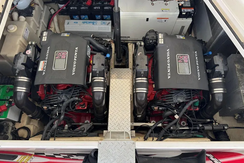 Slide: The Image of Engine compartment of 2005 Regal 3360 Window Express with dual Volvo Penta engines. - 41