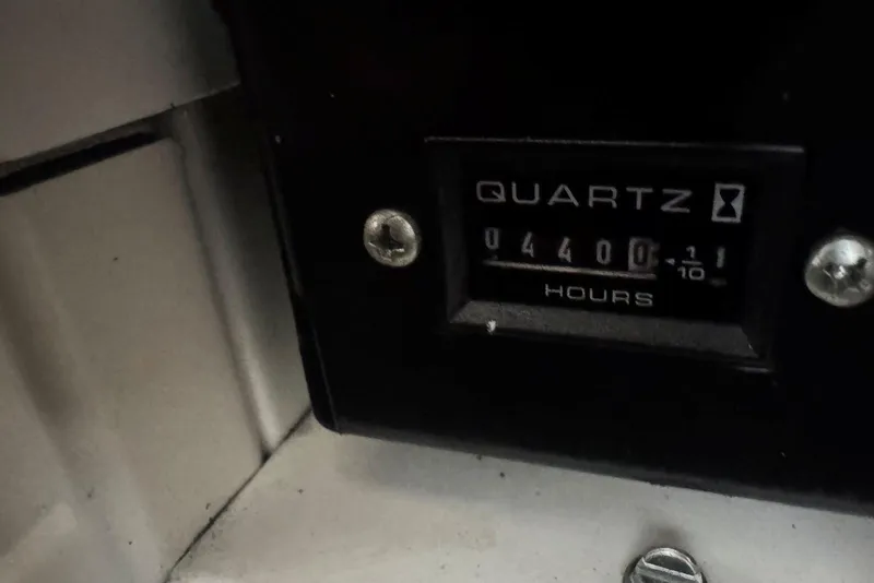 Slide: The Image of Hour meter showing 440 hours on 2005 Regal 3360 Window Express. - 42