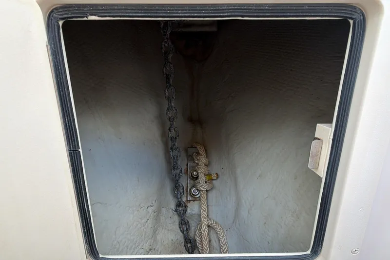 Slide: The Image of 2010 Grady-White Canyon 336 boat helm with steering wheel and control panel. - 10