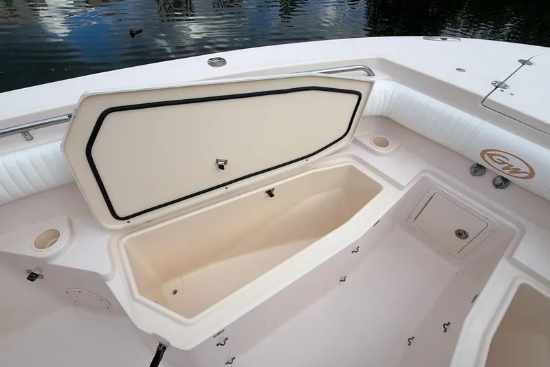 Slide: The Image of Bow view of 2010 Grady-White Canyon 336 boat, featuring sleek design and white upholstery. - 39