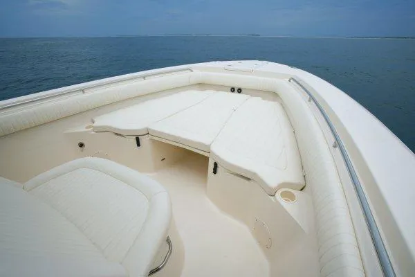 Slide: The Image of 2010 Grady-White Canyon 336 boat docked with twin Yamaha engines. - 9