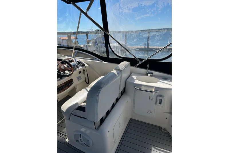 Slide: The Image of Interior view of 2007 Meridian 411SB yacht cockpit with steering wheel and sink. - 13