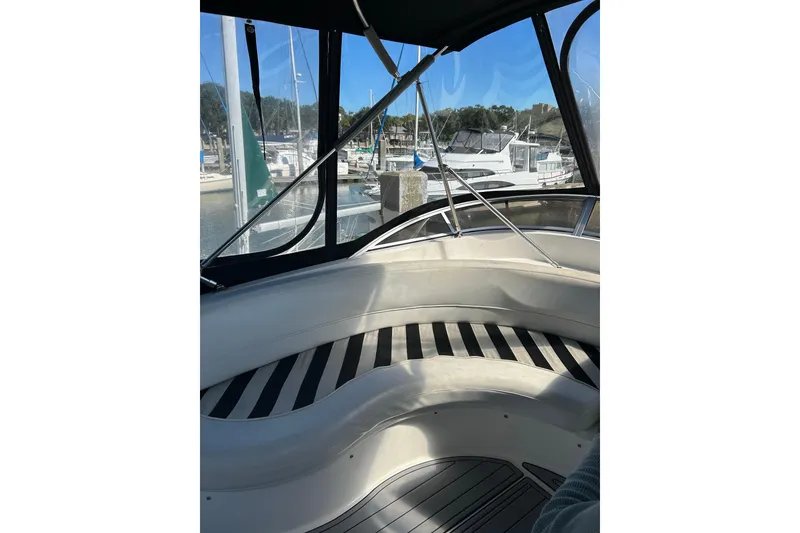 Slide: The Image of Interior view of 2007 Meridian 411SB yacht with marina backdrop. - 21