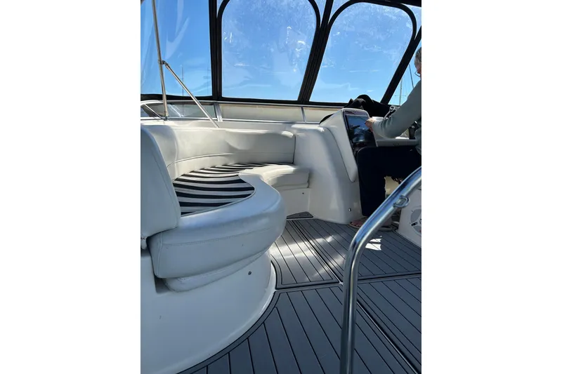 Slide: The Image of Interior of 2007 Meridian 411SB yacht with seating and steering area. - 22