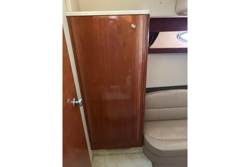 Slide: The Image of Wooden interior of 2007 Meridian 411SB yacht with seating and cabinetry. - 39